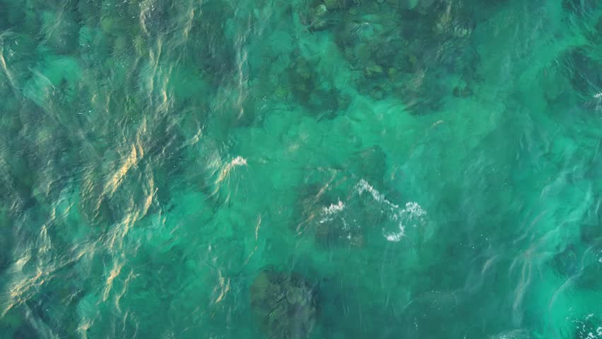 Clear Turquoise Water With Rocks