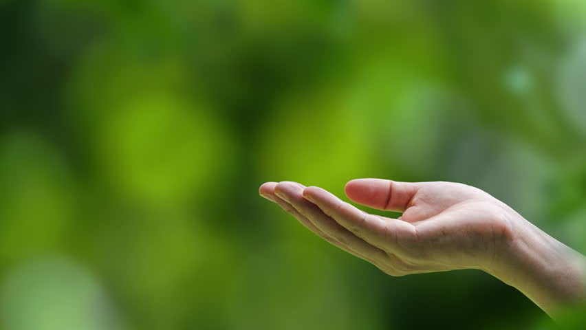 ESG concept with human hand holding digital globe with icons of green business, environment, social and governance sustainability.