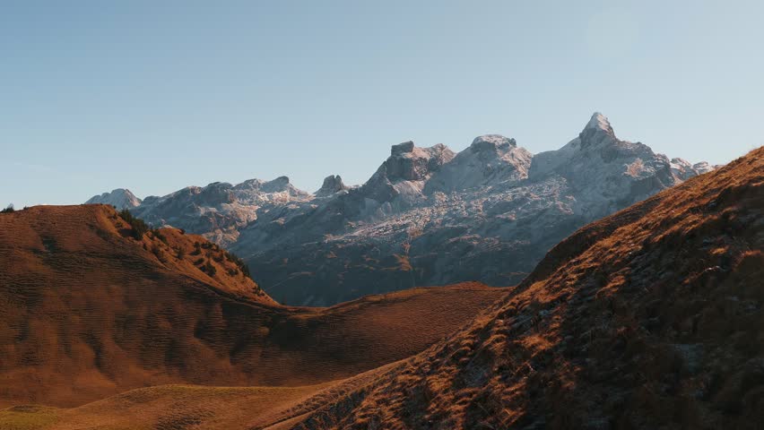 Rocky mountain peaks in Swiss Alps. Panorama of rocky mountain summits in autumn