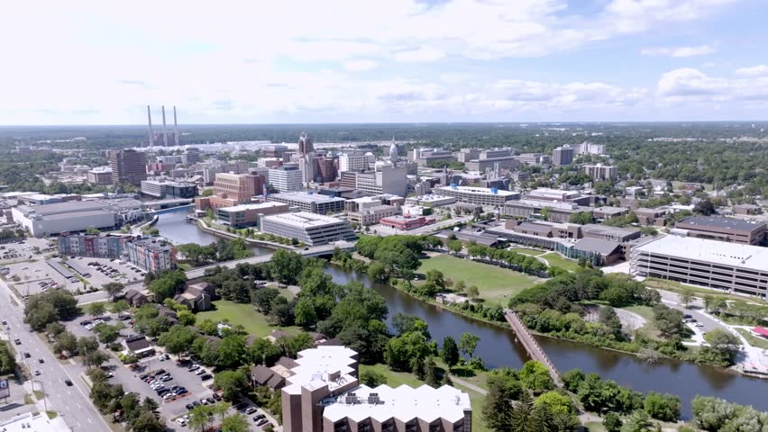 Downtown Lansing, Michigan with drone video wide right to left.