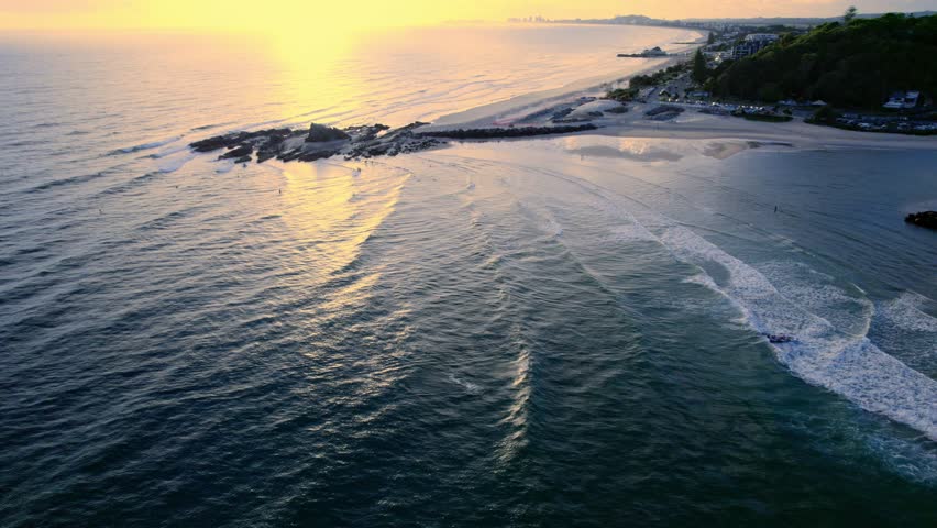 Currumbin Beach, Rock And Coastline During Sunrise In Queensland, Australia. - aerial shot
