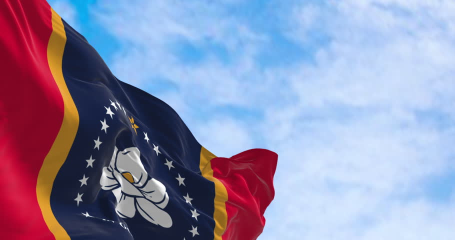 The new Mississippi In God We Trust state flag waving in the wind. Seamless 3d render animation. Slow motion loop. Selective focus