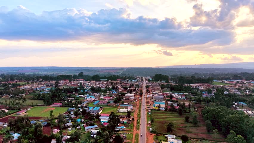 Rural cityscape kenya city skyline. Rural village of kenya. Aerial drone rural towns of kenya- slums . Sunset view of the small village in kenya. Roads of kenya.
