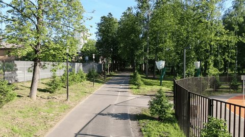 Drone Flying Forward along Park Alley Moscow