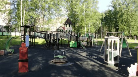 Drone Sliding Sideways along Park Play Area