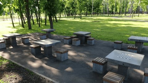Drone Lifting above Chess Tables Park