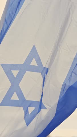 A Flag of Israel Fluttering in the Breeze