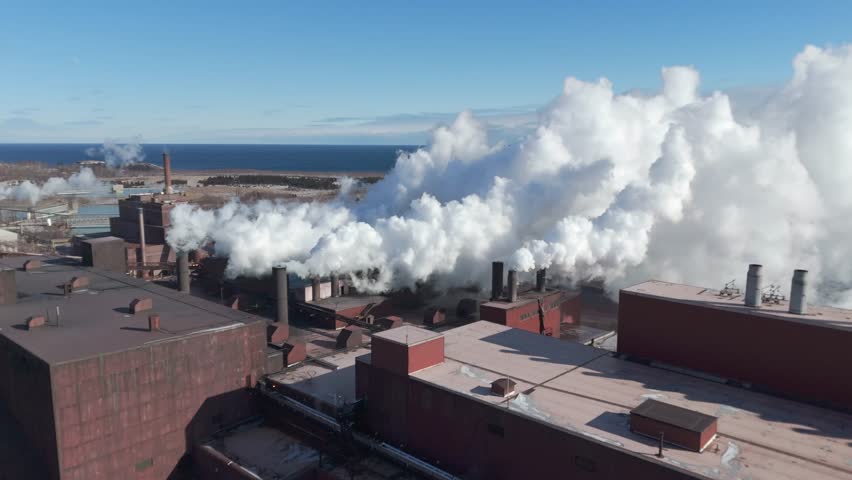 Industry factory polluting the air with CO2 emissions