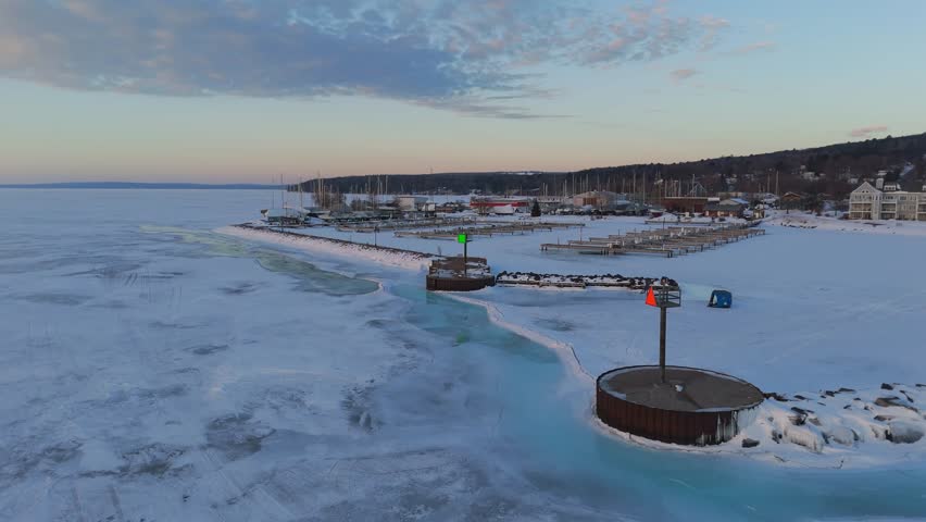 Small coastal town Bayfield Wisconsin with Lake Superior surface frozen, winter wonderland