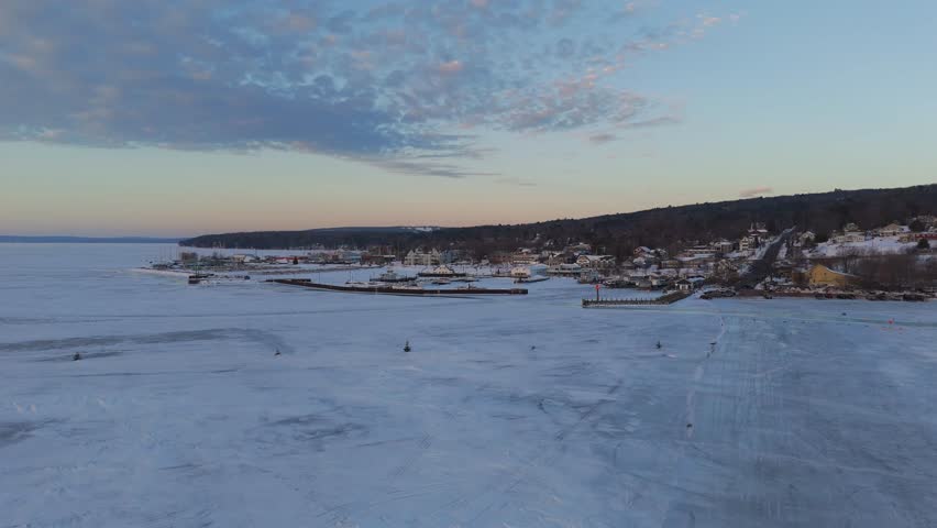 Winter Morning at Bayfield Wisconsin with Lake Superior frozen, majestic landscape aerial view