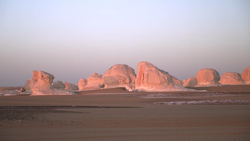 White Desert Egypt Chalk Rock Formations at Dusk with Dramatic Sky
