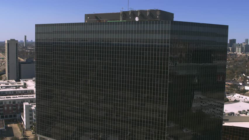 Establishing aerial shot of a commercial office building in Houston