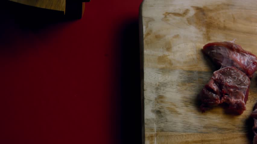 Top view of raw beef and fresh vegetables ready to be cooked