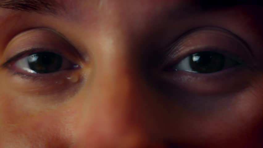 Close up of a person tearing up