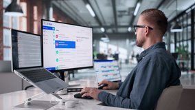 Businessman Carefully Checking Emails On Desktop Screen In Small Office. - Powered by Shutterstock - Get 15% off with code: PIKWIZARD15