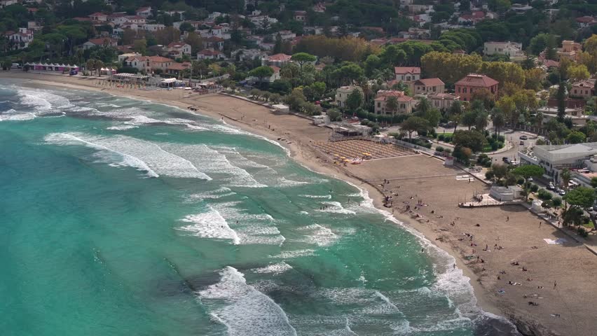 Mondello Beach near Palermo. Drone footage of Spiaggia di Mondello in Palermo, Sicily, Italy. Turquoise sea, sandy Beach