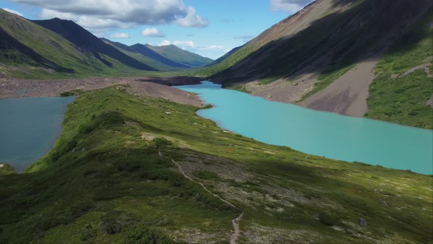 Fantastic aerial view of the emerald Eagle and Symphony Lake. Famous Location in Chugach mountains in Alaska