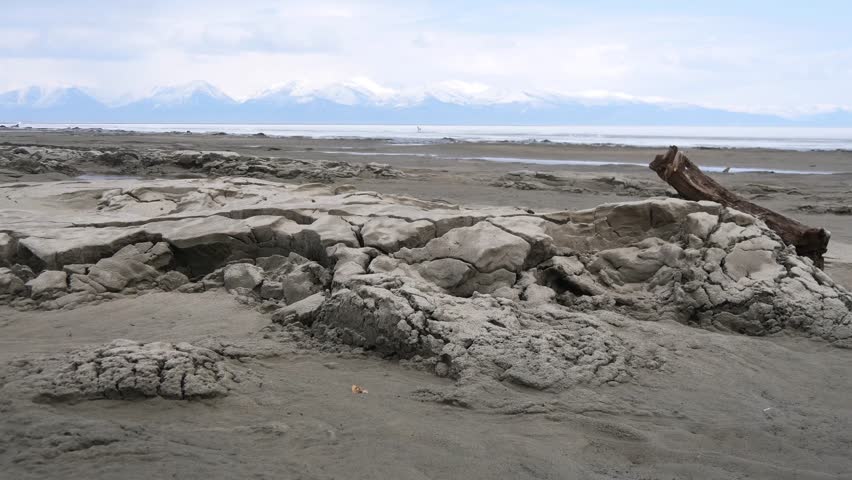The icy shore of Lake Baikal in Russian Siberia in late spring. The northernmost point of Lake Baikal is located in the small town of Nizhneangarsk.

