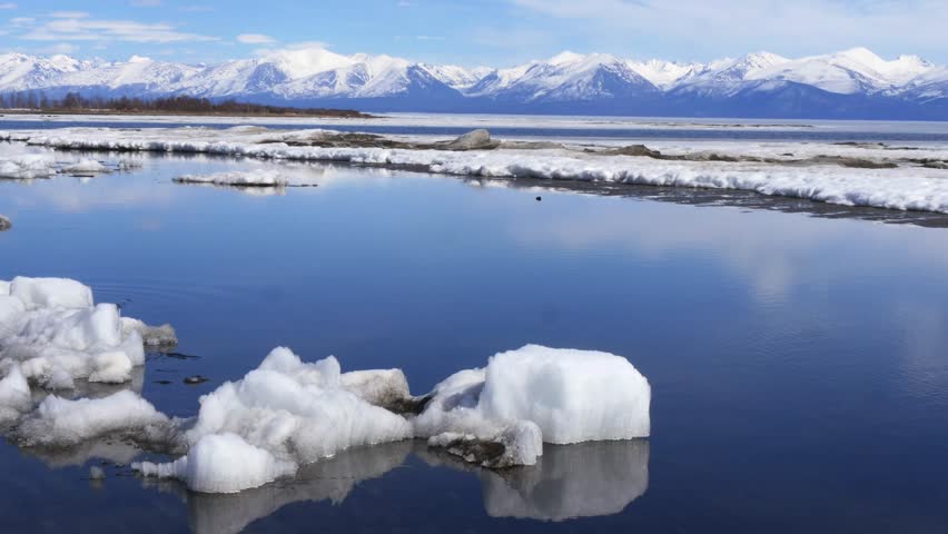 The icy shore of Lake Baikal in Russian Siberia in late spring. The northernmost point of Lake Baikal is located in the small town of Nizhneangarsk.
