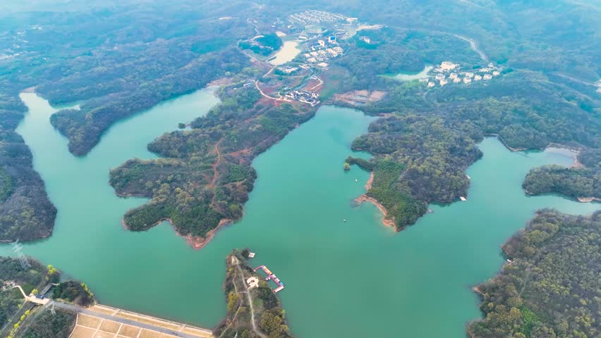 Majestic Mountains Forests and Reservoir Shorelines From Above 4K Aerial