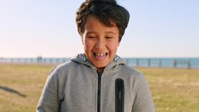 Travel, face and child at park, laughing and relax on peaceful vacation and calm on break in nature. Happiness, portrait and boy with humor on holiday, tourism and fresh air on weekend in Canada - Powered by Shutterstock - Get 15% off with code: PIKWIZARD15