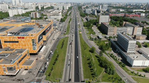Drone Tilting Down over Moscow Highway Traffic