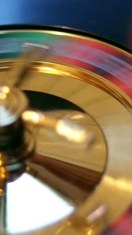 Ball hits 13 on roulette, closeup vertical video in 4k.