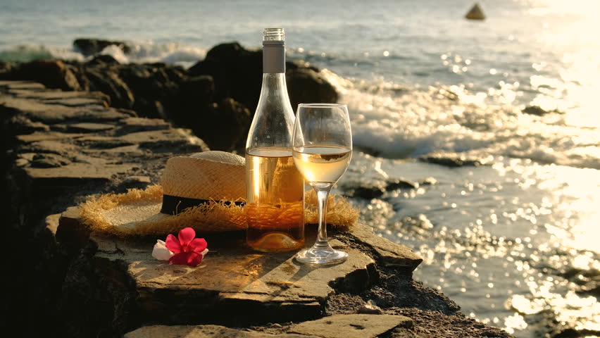 Wine on the seashore. Selective focus.