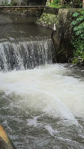 Close Up Powerful Water Cascade in River Dam with White Foam and Refreshing Splash Texture Background