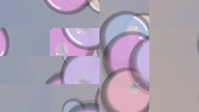 A sequence of pastel colored bubbles with reflections and shadows on a gray background - Powered by Shutterstock - Get 15% off with code: PIKWIZARD15