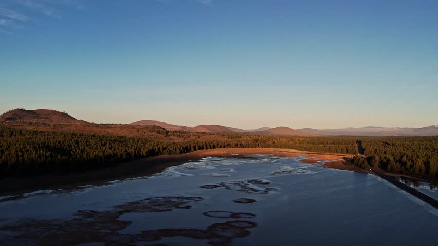 drone footage of grassy lakes in northern california

