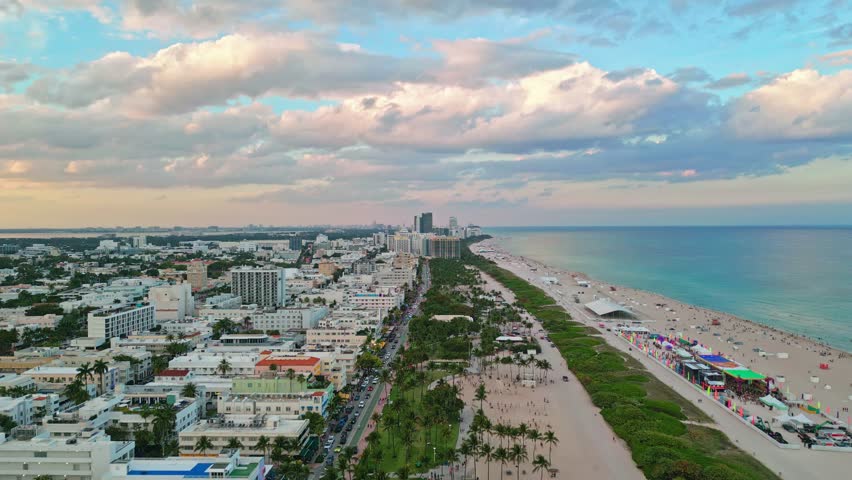 Miami seaside with turquoise ocean and sky. Miami Beach skyline. Panoramic Miami coastline. Miami coastal cityscape.