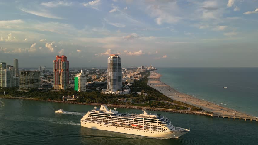 Miami Beach city aerial view. Panoramic Miami coastline. Miami seaside with turquoise ocean and sky. Miami Beach skyline.