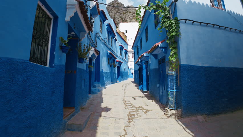 Walk On A Sunny Day In Chefchaouen, Morocco