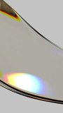 3D rendering of liquid iridescent smooth wave. Transparent glass with dispersion. Seamless loop holographic vertical animation. - Powered by Shutterstock - Get 15% off with code: PIKWIZARD15
