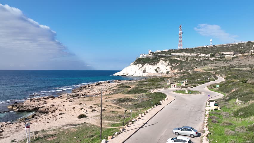 Aerial View of the Stunning Rosh HaNikra White Cliffs and Turquoise Mediterranean Waters in a Beautiful Coastline Landscape