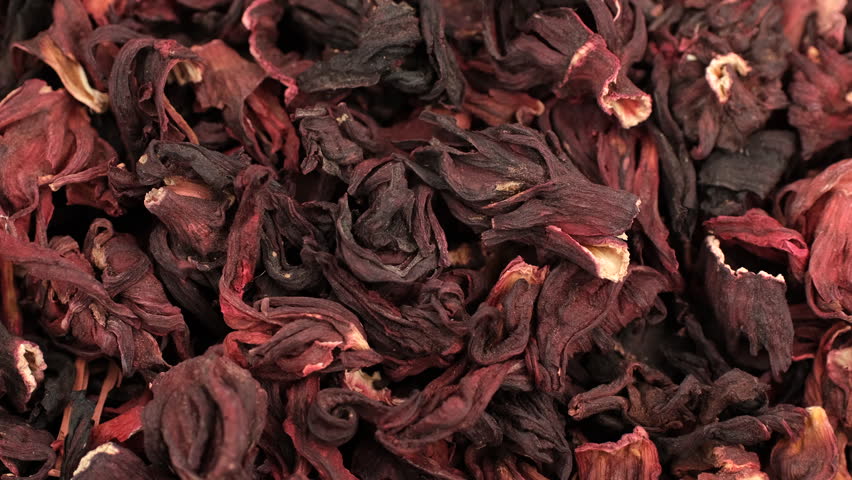 Heap of dried organic flowers hibiscus tea, rotation
