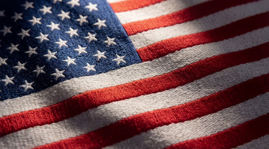 American flag close-up. Red, white, and blue stripes. Stars on blue field. Soft light highlights fabric texture. Ideal for patriotic, national, or historical projects,seamless loop