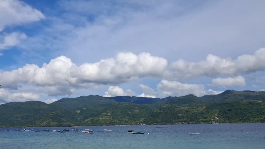 A scenic view of the bay under a cloudy afternoon sky