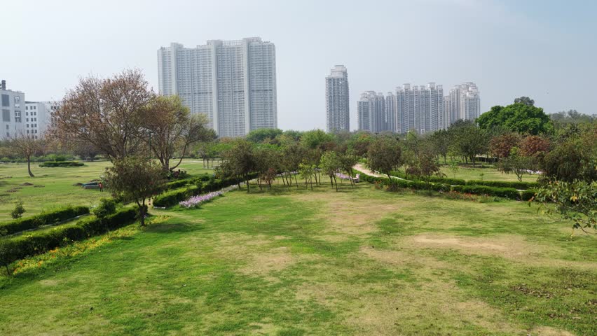 Park with residential building in new delhi, india 