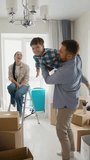 Happy family celebrating moving into new home - Powered by Shutterstock - Get 15% off with code: PIKWIZARD15
