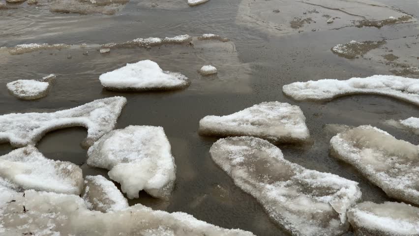 ice floes on the surface of the water of the winter sea