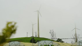Wind Turbines Work for Renewable Energy To Generate Electricity. Selective Focus Shot - Powered by Shutterstock - Get 15% off with code: PIKWIZARD15