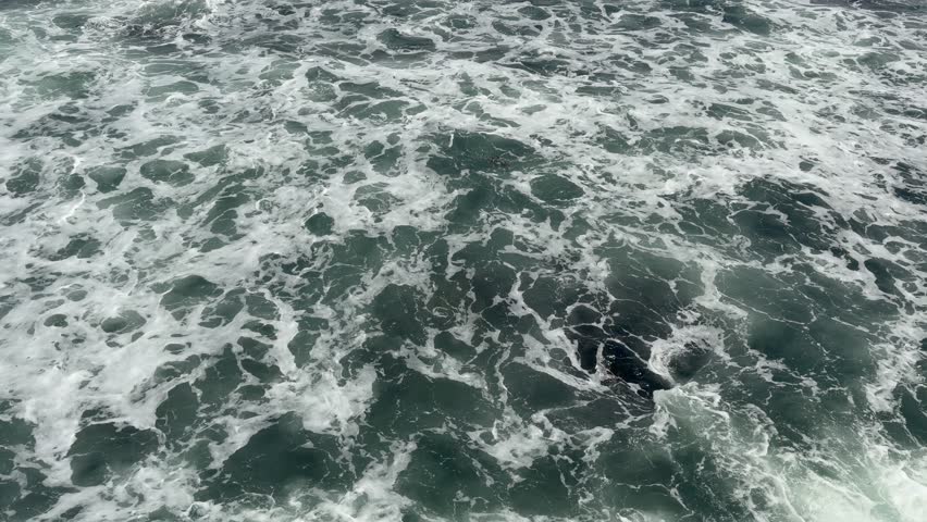 The surface of the water near a breakwater area of seawater in Cape Town.