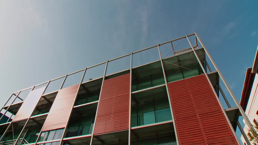 Wide Shot of Modern Office Building Facade with Steel Glass and Wood