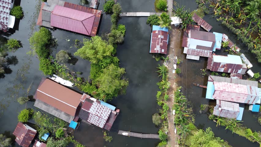 Farmer housing located in an agricultural area that is experiencing flooding