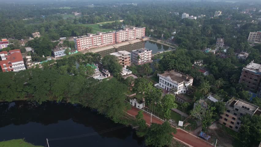 Aerial View of Modern Residential Apartments and Reflecting Pond in Bangladesh