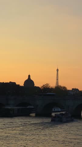 Sunset Over Seine River and Historic Bridge in Paris, France