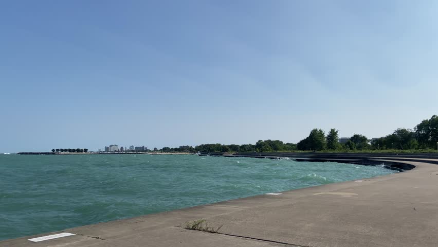 Panorama Pan from 31st Street Beach to Chicago Skyline across Lake Michigan, Summer Day, USA