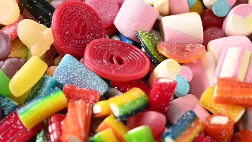 Colorful assortment of candies background.